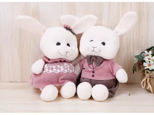 Close-up detail view of the cute couple rabbit plush toy featuring a nice lace dress and bow.