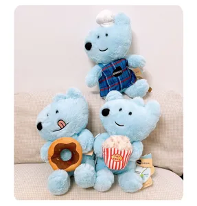 Cute blue puppy plush toy set featuring chef, donut and popcorn designs, soft and cuddly.