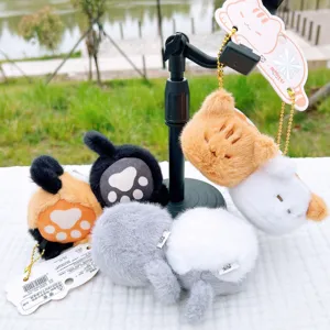 Cute magnetic cat paw plush pendant set, soft stuffed kitten keychain toy for bags and gifts.