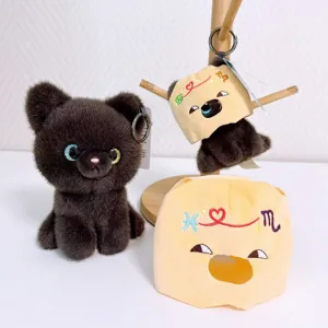 Cute black cat plush toy keychain with zodiac sign head cover, soft doll pendant gift.