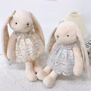 Cute lop-eared bunny plush toy with lace floral dress, soft stuffed rabbit doll gift for kids.