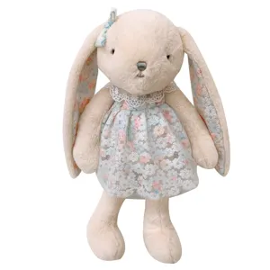 Cute floppy-eared plush rabbit toy wearing floral lace dress, soft stuffed bunny doll for kids.