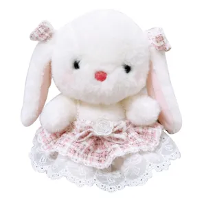 Cute long-ear white plush rabbit toy wearing a pink tweed skirt with lace hem, sweet girl gift doll.