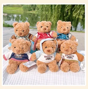 Cute plush teddy bear doll toy wearing stylish hoodie and jacket, perfect gift for kids.