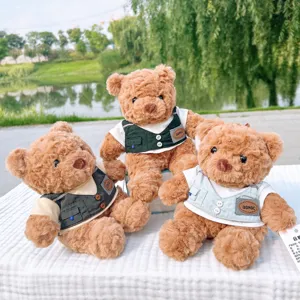 Cute teddy bear plush toy with stylish vest, soft stuffed animal doll gift for kids.