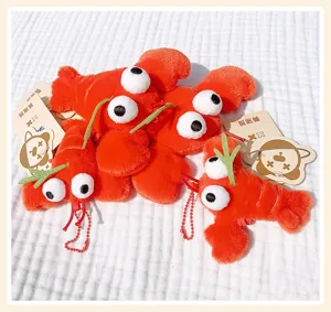 Cute plush lobster keychain toy with big googly eyes and funny sprout detail, soft toy gift.