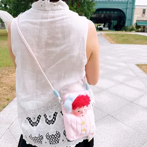 Bolso bandolera de felpa rosa con adorable muñeca de pelo rizado rojo para diario.