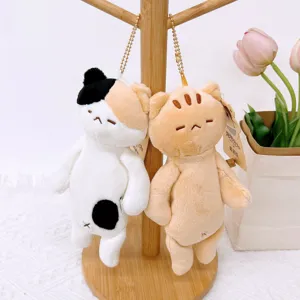 Cute plush cat keychain and bag charm, soft stuffed animal pendant for backpack decor.