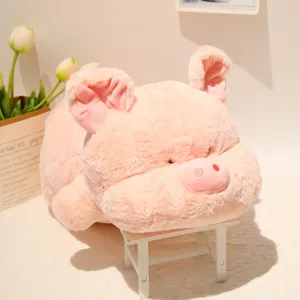 Cute pink plush pig stuffed animal toy, soft lying style doll for kids and home decor.