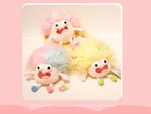 Cute fluffy monster plush doll toy with funny big eyes and soft hair, perfect gift for kids.