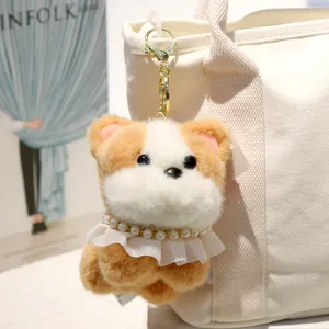Simpatico portachiavi cucciolo in peluche con colletto in pizzo di perle, morbido ciondolo per borsa.