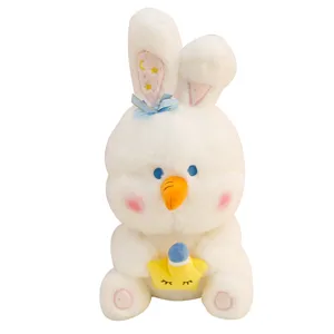 Cute white rabbit plush toy bunny doll with carrot nose and holding a soft star pillow.