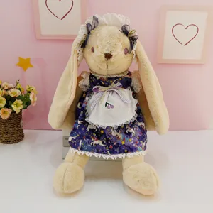 Cute lop-eared plush rabbit toy in a purple galaxy lolita dress with lace apron and bows.