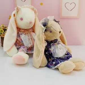 Cute big ear rabbit plush toy with floral dress, soft stuffed doll pillow for girls and gifts.
