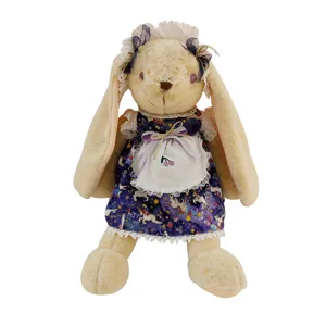 Cute lop-eared plush bunny toy wearing starry dress and lace bonnet for gifts.