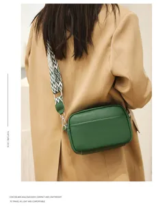 Stylish genuine leather crossbody bag for women, compact casual shoulder bag with wide strap.