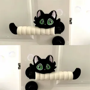 Cute black cat door handle cover with green eyes, plush anti-collision protector for home decor.