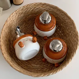 Chunky ceramic foaming soap dispenser cute cartoon hand sanitizer bottle with pump for bathroom.