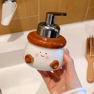 Cute ceramic foaming soap dispenser pump detail view for modern bathroom sink and daily use.