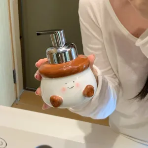 Cute ceramic foaming soap dispenser bottle for bathroom sink hand wash container decor.