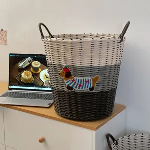Detailed view of large laundry basket with cute dog patch and woven rattan design for home.