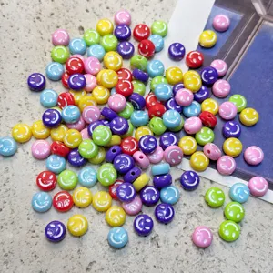 Colorful acrylic smiley face beads for DIY jewelry making, ideal for phone charms and bracelets.
