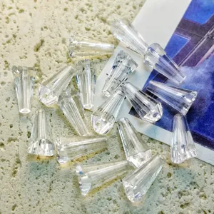 Detailed view of clear acrylic pagoda beads with faceted design, perfect for DIY jewelry crafts.