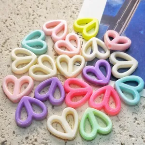 Colorful acrylic hollow heart beads 17x15mm, perfect for DIY jewelry making and crafts.