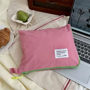 Wasserdichte Reise-Aufbewahrungstasche in Rosa und Grün mit Reißverschluss für Koffer.