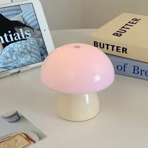 Detailed view of cute pink mushroom night light with touch switch for cozy bedroom decor.