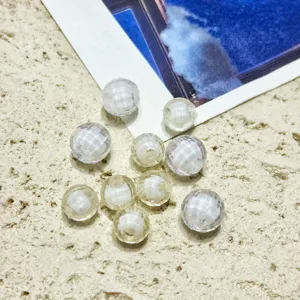 Detail shot of 8-10mm transparent acrylic globe beads with inner white core for DIY jewelry craft.