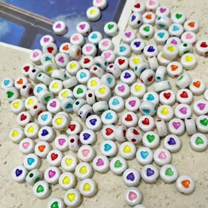 Acrylic heart beads details, white base with colorful heart patterns for DIY jewelry and phone charms.