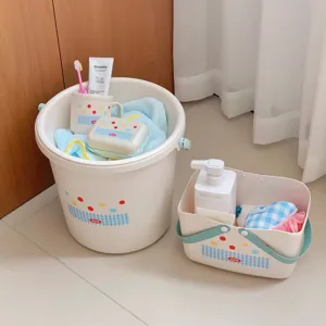 Dormitory washing storage set detail showing bucket, basket, cup, and toiletries inside.