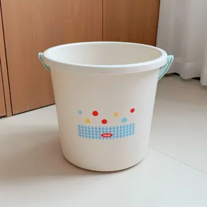 Plastic storage bucket with handle and cute dotted pattern for student dorm daily use.