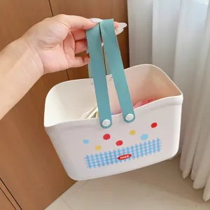 Portable plastic shower caddy basket with cute polka dot and plaid pattern for students.