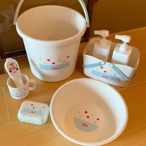 Dormitory washing six-piece set detail view, white plastic bucket, basin, and storage basket.