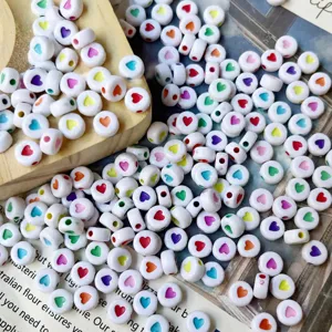 Colorful acrylic heart beads, flat round DIY loose beads for handmade jewelry bracelets making detail view.