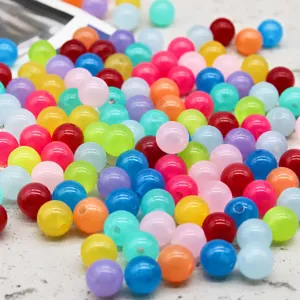 Colorful plastic round beads with holes for DIY handmade necklaces and bracelets accessories.