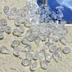 Acrylic teardrop crystal bead detail showing clear faceted surface for jewelry crafting.
