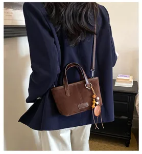 Retro suede bucket bag for women, trendy small niche shoulder and crossbody bag.