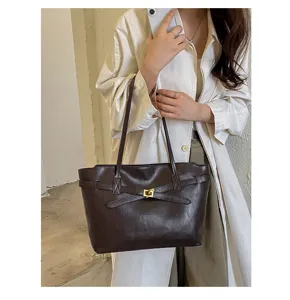 Retro brown leather shoulder bag, stylish commuter tote with metal lock and chic strap design.