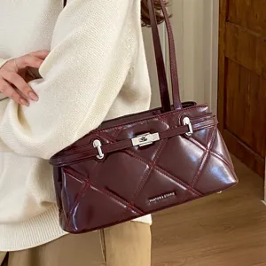 Chic burgundy quilted shoulder bag for women, stylish underarm handbag with metal turn-lock.