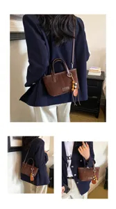 Retro suede bucket bag for women, chic casual shoulder crossbody bag with tassel decor.