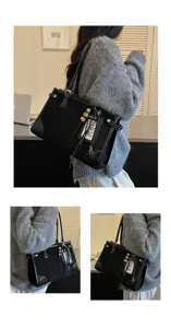 Classic black retro tote bag for women, large capacity shoulder bag for daily commute.