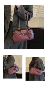 Detailed view of vintage underarm shoulder bag, stylish retro design with chic buckle.