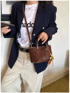 Vintage suede bucket bag for women, chic small crossbody bag and casual shoulder bag.