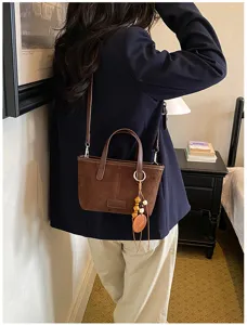 Vintage brown suede women shoulder bag with wooden beads pendant, casual crossbody bucket bag.