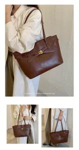Minimalist vintage brown leather tote bag, stylish large capacity shoulder bag for daily commute style.