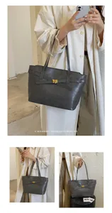 Minimalist retro tote bag for women, large capacity commuter shoulder bag with chic belt design.