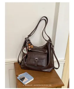 Retro braune Leder Pendler Tasche, vielseitige Schulter- und Umhängetasche mit Fronttasche.